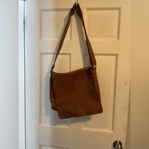 Roots messenger bag 14 years ago. Well used but still in great condition.